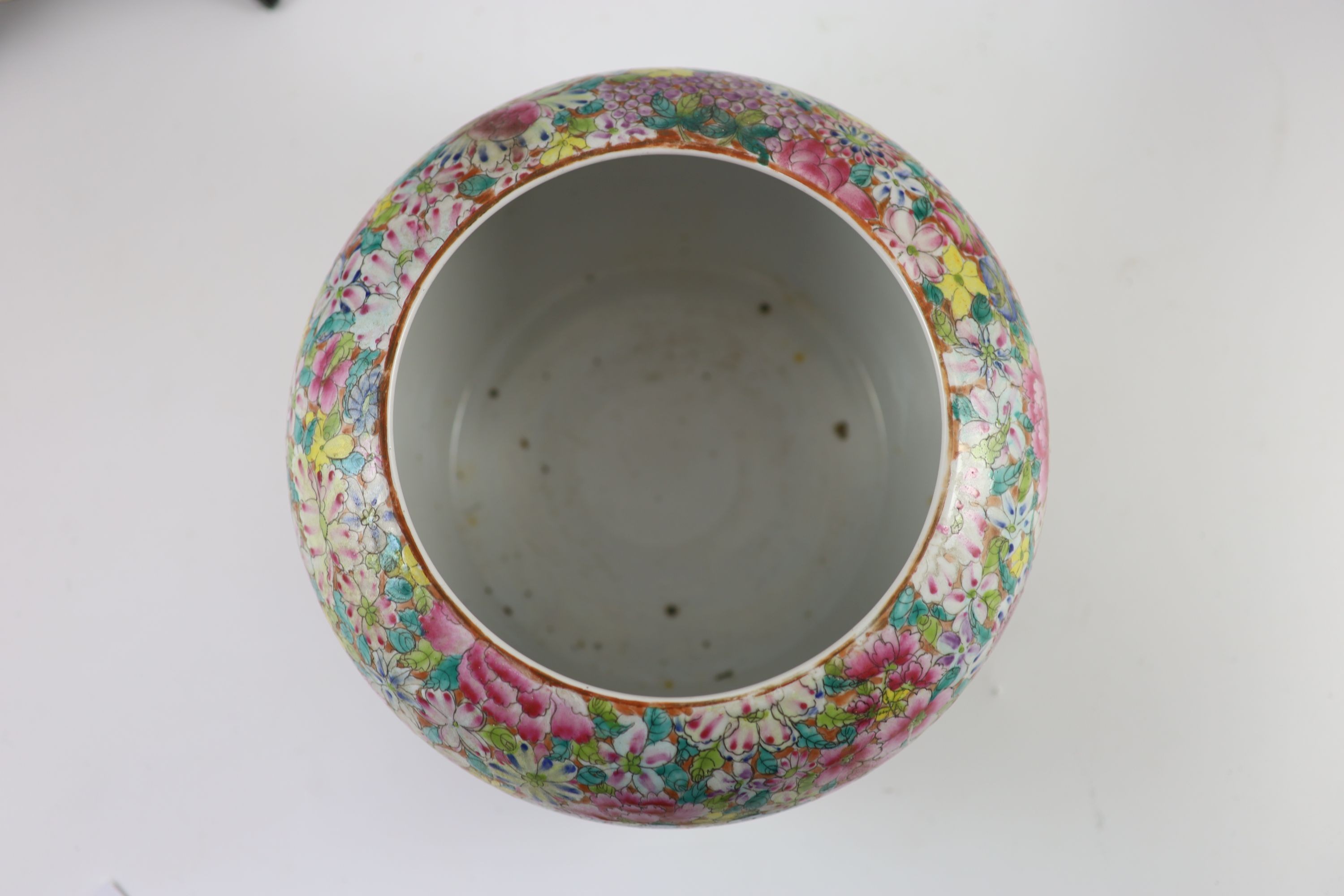 A near pair of Chinese famille rose’millefleur’ dishes and a similar alms bowl, Republic period, Dishes 32.5 and 33.5 cm diameter, bowl 24 cm diameter